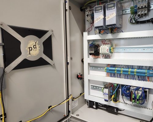 Control panel with VFDs and HMI.