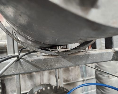 Strain gauge retrofit on custom hazardous waste vessels.