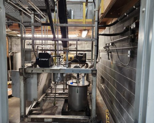 Installing a new vacuum pump to add capacity to a Retort process.